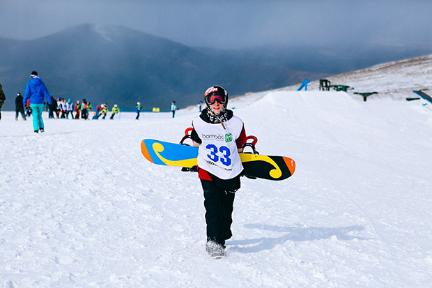 Stu Innes holds on tight to his board. Photo: Joe Hart